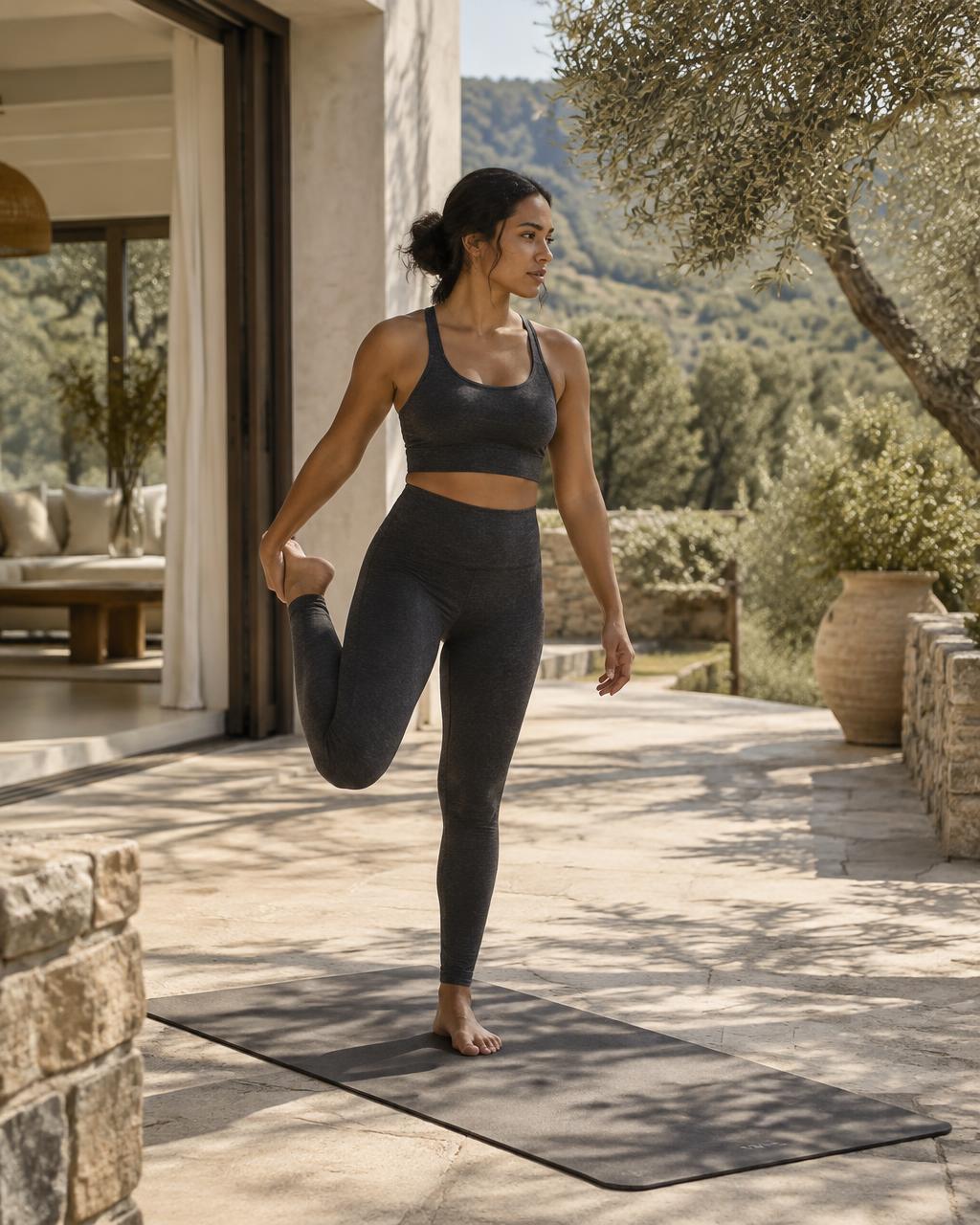 A woman making time to stretch at home